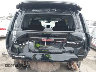 2015 GMC Yukon SLT with VIN 1GKS1BKC3FR129173, listed as a IAAI auction lot 41795585 with 97,893 mi miles. Bid and sale history available at carsss.com. Image 6.