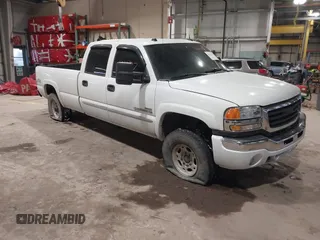 2004 GMC Sierra 2500HD SLE z VIN 1GTHK23134F120214, wystawiony jako IAAI lot #41611677 z przebiegiem 315 585 mil mil oraz . Historia ofert i sprzedaży dostępna na DreamBid. Obrazek 1.