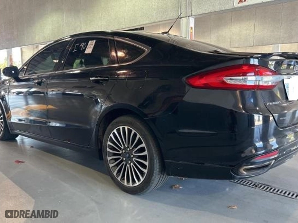 2018 Ford Fusion Titanium with VIN 3FA6P0D96JR159241, listed as a Copart auction lot 72607284 with 137,652 mi miles and Clean Title. Bid and sale history available at carsss.com. Image 3.