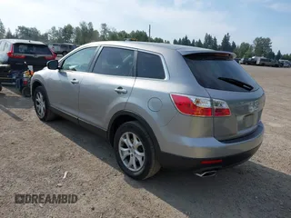 2012 Mazda CX-9 Sport z VIN JM3TB3BA9C0348888, wystawiony jako IAAI lot #42520255 z przebiegiem 138 012 mil mil oraz . Historia ofert i sprzedaży dostępna na DreamBid. Obrazek 3.