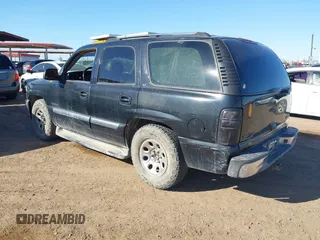 2005 GMC Yukon SLT with VIN 1GKEC13T25R206811, listed as a IAAI auction lot 41849830 with 231,863 mi miles. Bid and sale history available at carsss.com. Image 3.