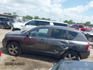 2016 Jeep Compass High Altitude with VIN 1C4NJDEB2GD730774, listed as a IAAI auction lot 42525209 with 143,193 mi miles and . Bid and sale history available at DreamBid. Image 14.
