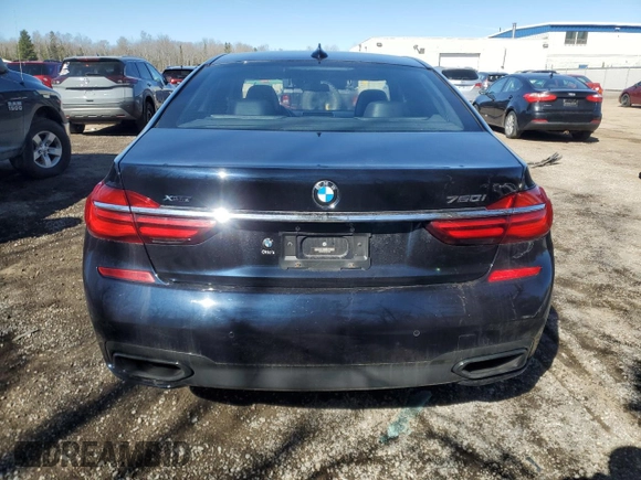 2017 BMW 7 Series 750i xDrive with VIN WBA7B0C55HG527032, listed as a Copart auction lot 52026415 with 67,722 mi miles and Clean title. Bid and sale history available at DreamBid. Image 6.