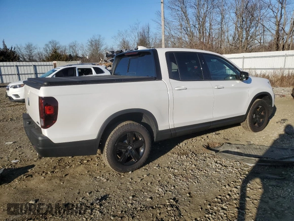 2023 Honda Ridgeline Black Edition with VIN 5FPYK3F82PB055208, listed as a Copart auction lot 87029914 with 33,687 mi miles and Salvage title. Bid and sale history available at DreamBid. Image 3.