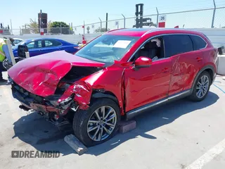2020 Mazda CX-9 Signature with VIN JM3TCBEY7L0406190, listed as a IAAI auction lot 42397660 with 55,007 mi miles and . Bid and sale history available at DreamBid. Image 2.