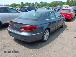 2013 Volkswagen CC Sport Plus z VIN WVWBP7AN6DE502107, wystawiony jako IAAI lot #42368496 z przebiegiem 83 505 mil mil oraz . Historia ofert i sprzedaży dostępna na DreamBid. Obrazek 4.
