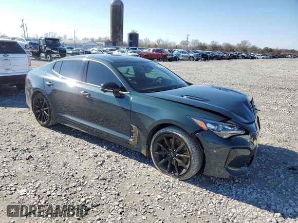 2023 Kia Stinger GT2 with VIN KNAE55LC0P6136420, listed as a Copart auction lot 87606705 with 72,990 mi miles and Salvage Title. Bid and sale history available at carsss.com. Image 4.