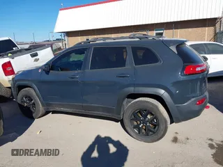 2017 Jeep Cherokee Trailhawk L Plus with VIN 1C4PJMBBXHW634944, listed as a IAAI auction lot 41022673 with 116,542 mi miles. Bid and sale history available at carsss.com. Image 15.