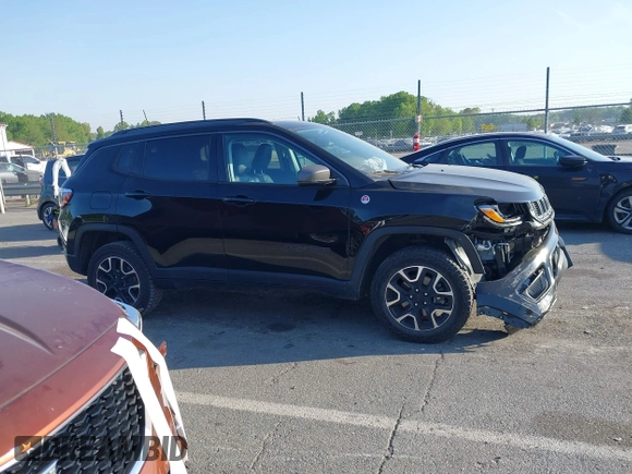 2019 Jeep Compass Trailhawk with VIN 3C4NJDDB5KT800515, listed as a IAAI auction lot 42059594 with 60,338 mi miles and . Bid and sale history available at DreamBid. Image 13.