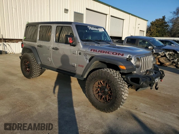 2020 Jeep Wrangler Unlimited Rubicon with VIN 1C4HJXFG6LW309146, listed as a Copart auction lot 88423285 with 65,288 mi miles and Salvage title. Bid and sale history available at DreamBid. Image 4.