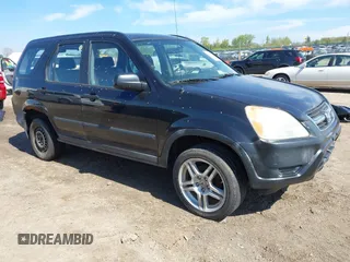 2002 Honda CR-V LX with VIN JHLRD68402C018458, listed as a IAAI auction lot 42206935 with 212,229 mi miles and . Bid and sale history available at carsss.com. Image 1.
