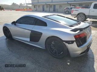2017 Audi R8 z VIN WUAKBAFX3H7901379, wystawiony jako Copart lot #81711484 z przebiegiem 27 411 mil mil oraz Szkoda całkowita • Salvage title. Historia ofert i sprzedaży dostępna na DreamBid. Obrazek 2.