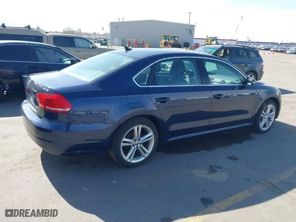 2014 Volkswagen Passat TDI SE w/Sunroof with VIN 1VWBN7A30EC055207, listed as a IAAI auction lot 41893637 with 133,074 mi miles. Bid and sale history available at carsss.com. Image 4.