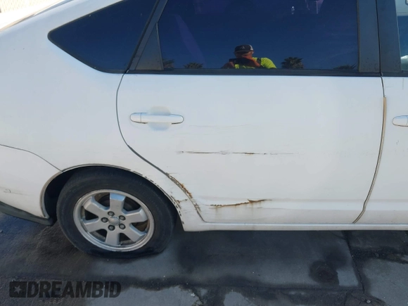 2004 Toyota Prius with VIN JTDKB20U240068565, listed as a IAAI auction lot 40417158 with 192,764 mi miles and . Bid and sale history available at DreamBid. Image 6.