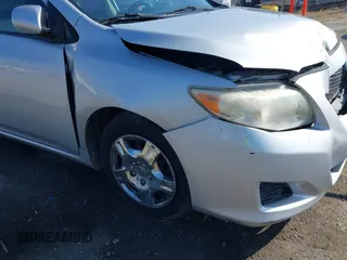 2009 Toyota Corolla with VIN JTDBL40E099056371, listed as a IAAI auction lot 42132122 with 204,016 mi miles and . Bid and sale history available at DreamBid. Image 13.