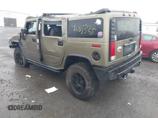 2005 Hummer H2 SUV with VIN 5GRGN23U35H130615, listed as a IAAI auction lot 41085325 with 138,393 mi miles. Bid and sale history available at carsss.com. Image 3.