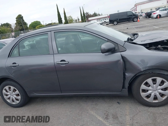 2009 Toyota Corolla with VIN JTDBL40E899066243, listed as a IAAI auction lot 41884292 with 219,338 mi miles. Bid and sale history available at carsss.com. Image 13.