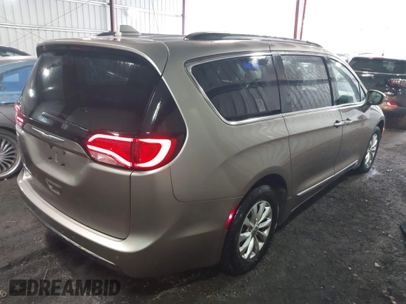 2017 Chrysler Pacifica Touring L with VIN 2C4RC1BG5HR565540, listed as a IAAI auction lot 41999464 with 110,056 mi miles and . Bid and sale history available at DreamBid. Image 4.