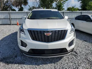 2024 Cadillac XT5 Premium Luxury AWD z VIN 1GYKNERS3RZ757814, wystawiony jako Copart lot #58976985 z przebiegiem 4 608 mil mil oraz Szkoda całkowita • Salvage title. Historia ofert i sprzedaży dostępna na DreamBid. Obrazek 5.