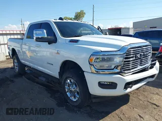 2024 Ram 2500 Laramie with VIN 3C6UR5FL4RG195798, listed as a IAAI auction lot 40654451 with 9,696 mi miles. Bid and sale history available at carsss.com. Image 1.