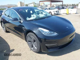 2018 Tesla Model 3 Long Range Battery with VIN 5YJ3E1EA7JF057031, listed as a IAAI auction lot 42139832 with 92,618 mi miles and . Bid and sale history available at DreamBid. Image 1.