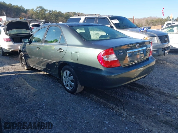 2003 Toyota Camry LE with VIN 4T1BE32KX3U689421, listed as a IAAI auction lot 41566812 with 192,673 mi miles and . Bid and sale history available at DreamBid. Image 3.