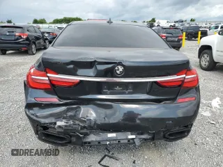 2016 BMW 7 Series 750i with VIN WBA7F0C53GGM20760, listed as a Copart auction lot 57230334 with 77,588 mi miles and Salvage Title. Bid and sale history available at carsss.com. Image 6.