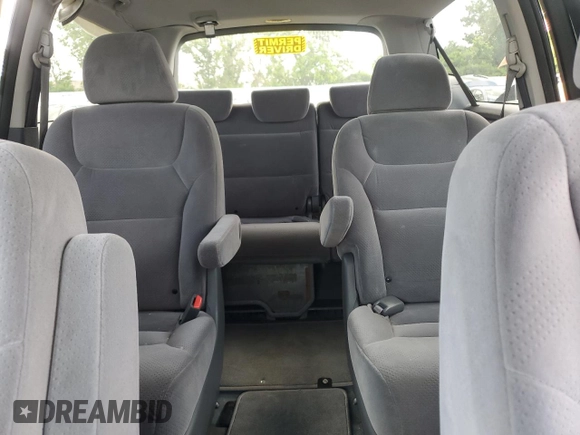 2007 Honda Odyssey LX z VIN 5FNRL382X7B084104, wystawiony jako Copart lot #57399625 z przebiegiem 213 134 mil mil oraz Szkoda całkowita • Salvage title. Historia ofert i sprzedaży dostępna na DreamBid. Obrazek 10.
