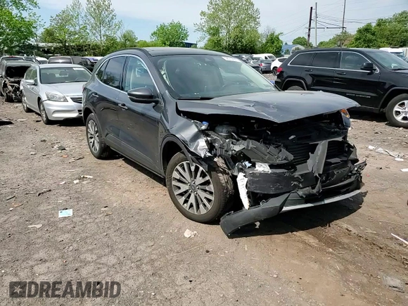 2020 Ford Escape Titanium с VIN 1FMCU9J99LUC63261, выставлен на аукционе Copart как лот 56312955 с пробегом Не указан миль и Списание • Salvage title. История ставок и продаж доступна на DreamBid. Изображение 14.