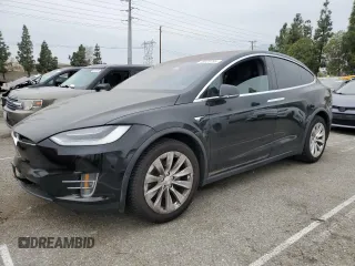 2019 Tesla Model X 75D with VIN 5YJXCDE27KF188317, listed as a Copart auction lot 48020795 with 60,944 mi miles and Salvage Title. Bid and sale history available at carsss.com. Image 1.