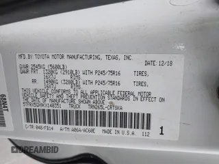 2019 Toyota Tacoma SR with VIN 5TFRX5GN9KX140351, listed as a IAAI auction lot 42593591 with 202,707 mi miles and . Bid and sale history available at DreamBid. Image 9.