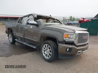 2015 GMC Sierra 1500 Denali z VIN 3GTU2WEJ6FG174160, wystawiony jako IAAI lot #40118246 z przebiegiem Nie podano mil oraz . Historia ofert i sprzedaży dostępna na DreamBid. Obrazek 1.