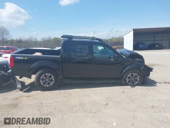 2014 Nissan Frontier SV with VIN 1N6AD0EV0EN758585, listed as a IAAI auction lot 41943169 with 186,214 mi miles and . Bid and sale history available at DreamBid. Image 13.