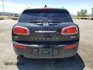 2017 MINI Clubman Cooper with VIN WMWLU1C5XH2C41871, listed as a Copart auction lot 61709154 with 87,570 mi miles and Salvage Title. Bid and sale history available at carsss.com. Image 6.