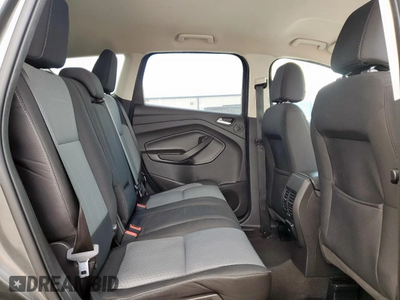 2017 Ford Escape SE z VIN 1FMCU9G91HUE17654, wystawiony jako Copart lot #56173175 z przebiegiem 97 678 mil mil oraz Czysty tytuł • Clean title. Historia ofert i sprzedaży dostępna na DreamBid. Obrazek 11.