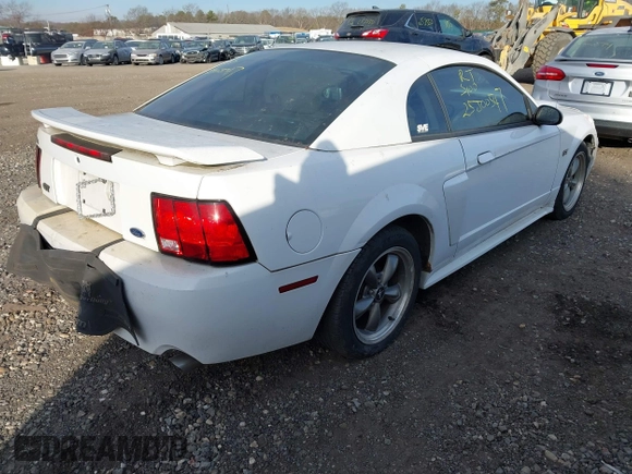 2003 Ford Mustang GT Deluxe with VIN 1FAFP42X03F309689, listed as a IAAI auction lot 41360816 with 999,999 mi miles. Bid and sale history available at carsss.com. Image 4.
