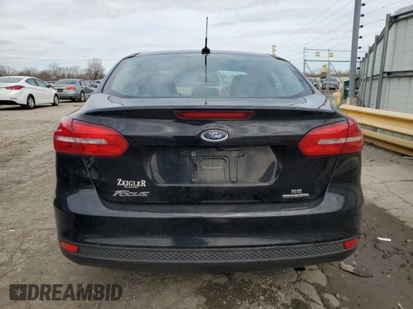 2016 Ford Focus SE z VIN 1FADP3F22GL237773, wystawiony jako Copart lot #49889515 z przebiegiem 131 073 mil mil oraz Szkoda całkowita • Salvage title. Historia ofert i sprzedaży dostępna na DreamBid. Obrazek 6.