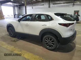 2022 Mazda CX-30 S with VIN 3MVDMBAL9NM410566, listed as a Copart auction lot 50513215 with 26,852 mi miles and Salvage Title. Bid and sale history available at DreamBid. Image 2.