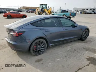 2021 Tesla Model 3 Performance with VIN 5YJ3E1EC5MF850673, listed as a Copart auction lot 47560665 with 96,950 mi miles and Salvage Title. Bid and sale history available at DreamBid. Image 3.