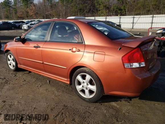 2009 Kia Spectra SX with VIN KNAFE221X95026213, listed as a Copart auction lot 85348104 with 124,171 mi miles and Salvage Title. Bid and sale history available at carsss.com. Image 2.