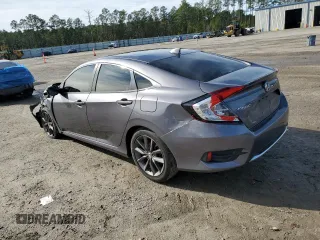 2021 Honda Civic Sedan EX-L with VIN 19XFC1F74ME002424, listed as a Copart auction lot 86898084 with 32,702 mi miles and Salvage Title. Bid and sale history available at carsss.com. Image 2.
