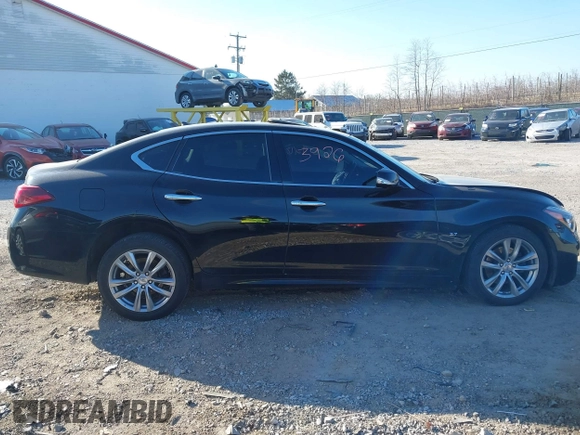 2015 Infiniti Q70 with VIN JN1BY1AR6FM560209, listed as a IAAI auction lot 41703926 with 117,503 mi miles and . Bid and sale history available at DreamBid. Image 13.