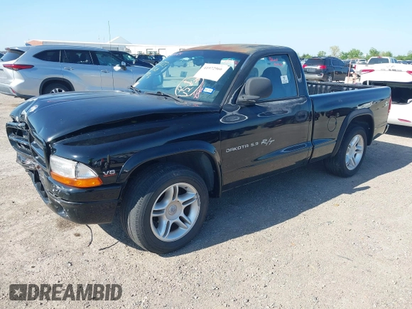 2000 Dodge Dakota SLT with VIN 1B7GL26ZXYS720333, listed as a IAAI auction lot 41972966 with 111,584 mi miles and . Bid and sale history available at DreamBid. Image 2.