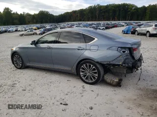 2017 Genesis G80 3.8L with VIN KMHGN4JE0HU191405, listed as a Copart auction lot 72058054 with 130,027 mi miles and Salvage Title. Bid and sale history available at carsss.com. Image 2.