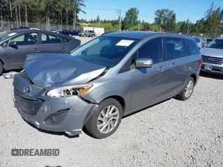 2014 Mazda 5 Sport z VIN JM1CW2BL0E0172678, wystawiony jako IAAI lot #42192057 z przebiegiem 89 848 mil mil oraz . Historia ofert i sprzedaży dostępna na DreamBid. Obrazek 2.