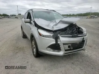 2013 Ford Escape SEL z VIN 1FMCU9H9XDUD00146, wystawiony jako Copart lot #60886165 z przebiegiem 198 557 mil mil oraz Szkoda całkowita • Salvage title. Historia ofert i sprzedaży dostępna na DreamBid. Obrazek 14.