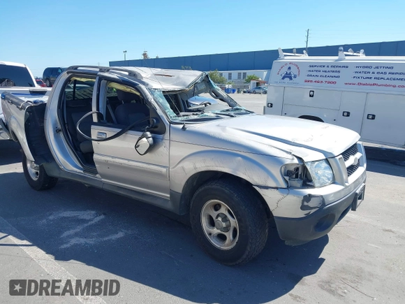 2005 Ford Explorer Sport Trac XLS z VIN 1FMDU67K25UA01209, wystawiony jako IAAI lot #39448448 z przebiegiem Nie podano mil oraz . Historia ofert i sprzedaży dostępna na DreamBid. Obrazek 1.