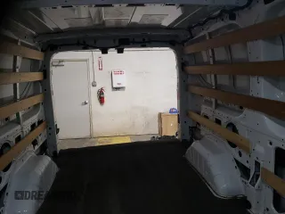 2023 Ford Transit Cargo with VIN 1FTBR1Y87PKA51654, listed as a Copart auction lot 82376064 with 18,442 mi miles and Clean Title. Bid and sale history available at DreamBid. Image 10.