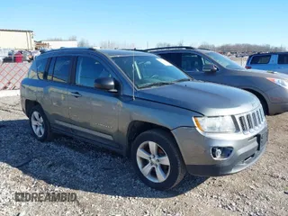 2012 Jeep Compass Latitude with VIN 1C4NJDEBXCD563543, listed as a IAAI auction lot 41711187 with 149,100 mi miles. Bid and sale history available at carsss.com. Image 1.
