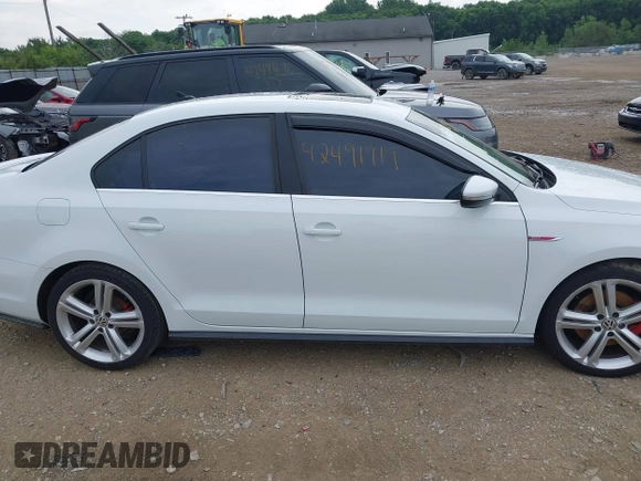 2017 Volkswagen Jetta GLI z VIN 3VW4T7AJ8HM349440, wystawiony jako IAAI lot #42491919 z przebiegiem 141 764 mil mil oraz . Historia ofert i sprzedaży dostępna na DreamBid. Obrazek 14.